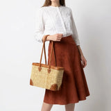 Long handles Reed basket with leather trim